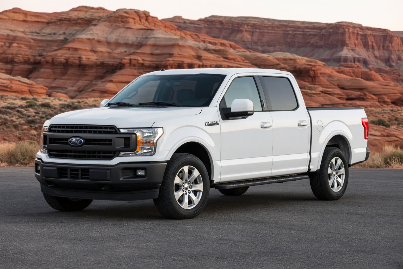 White 2019 Ford F-150 XLT pickup on an asphalt lot